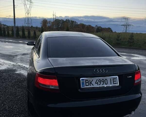 Черный Ауди А6, объемом двигателя 2 л и пробегом 247 тыс. км за 9200 $, фото 2 на Automoto.ua