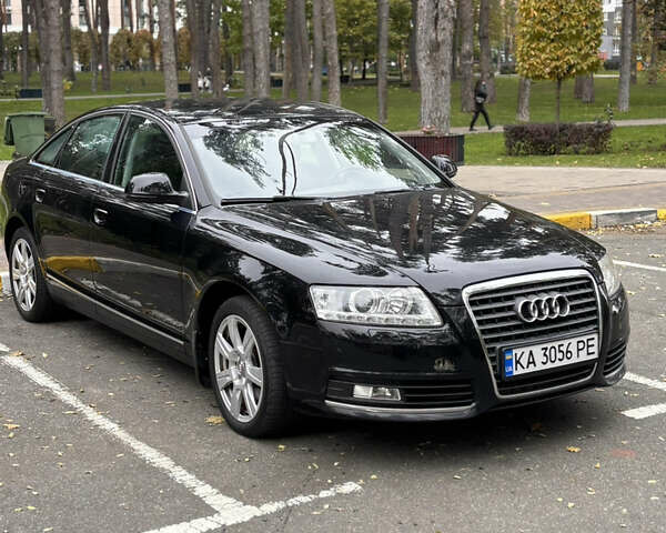 Черный Ауди А6, объемом двигателя 1.98 л и пробегом 264 тыс. км за 8700 $, фото 1 на Automoto.ua