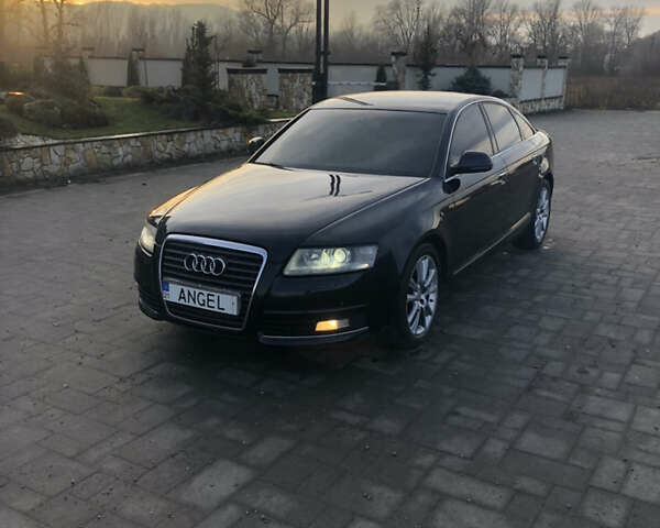 Черный Ауди А6, объемом двигателя 2 л и пробегом 300 тыс. км за 7800 $, фото 1 на Automoto.ua