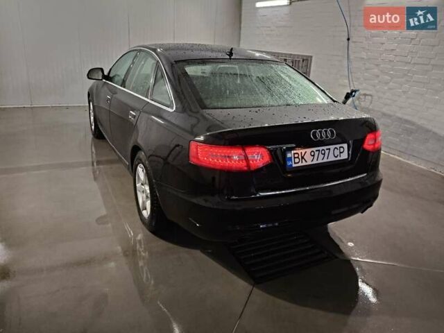 Черный Ауди А6, объемом двигателя 1.97 л и пробегом 330 тыс. км за 9400 $, фото 2 на Automoto.ua