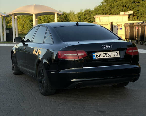 Чорний Ауді А6, об'ємом двигуна 2 л та пробігом 430 тис. км за 9300 $, фото 1 на Automoto.ua