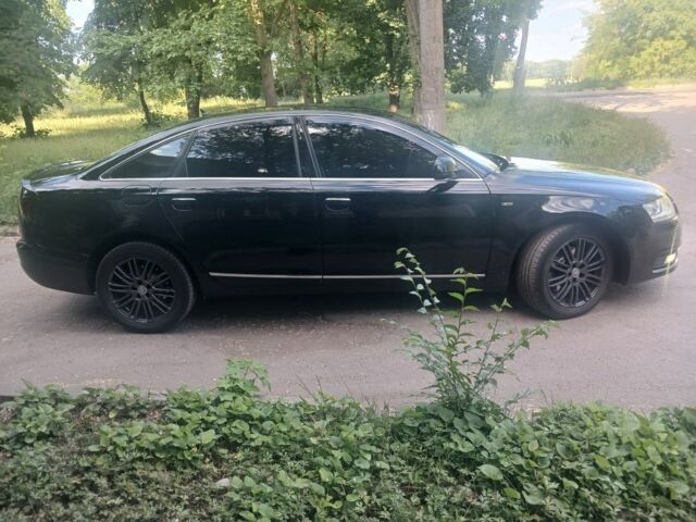 Черный Ауди А6, объемом двигателя 2 л и пробегом 286 тыс. км за 9800 $, фото 1 на Automoto.ua