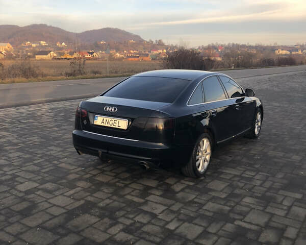 Черный Ауди А6, объемом двигателя 2 л и пробегом 300 тыс. км за 7800 $, фото 3 на Automoto.ua