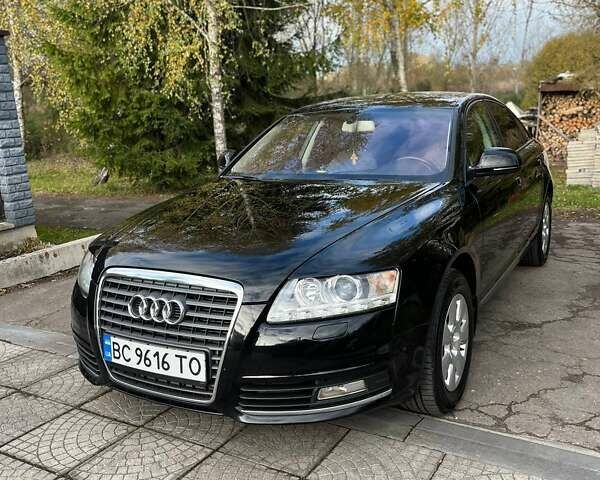 Черный Ауди А6, объемом двигателя 1.98 л и пробегом 164 тыс. км за 7500 $, фото 1 на Automoto.ua