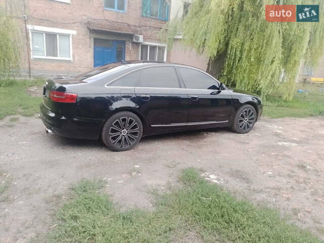 Ауди А6 2010 в Полтаве на Automoto.ua Черный Ауди А6, объемом двигателя 1.97 л и пробегом 290 тыс. км за 11000 $, фото 7 на Automoto.ua