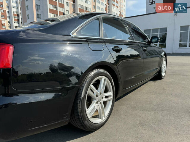 Черный Ауди А6, объемом двигателя 1.98 л и пробегом 235 тыс. км за 12500 $, фото 10 на Automoto.ua