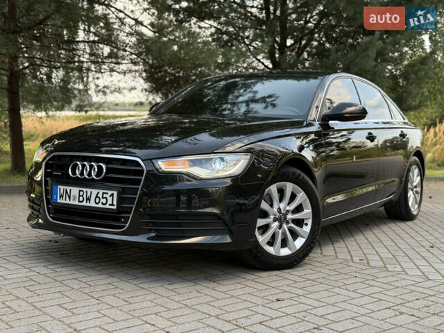 Чорний Ауді А6, об'ємом двигуна 2 л та пробігом 242 тис. км за 13499 $, фото 1 на Automoto.ua