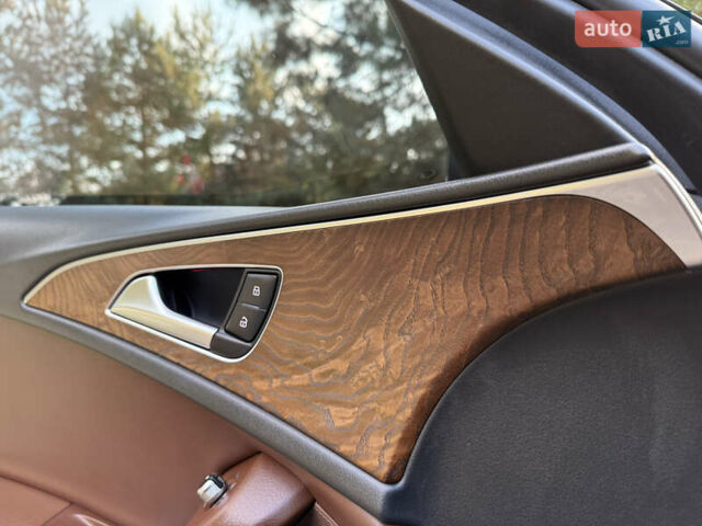 Чорний Ауді А6, об'ємом двигуна 2 л та пробігом 242 тис. км за 13499 $, фото 24 на Automoto.ua