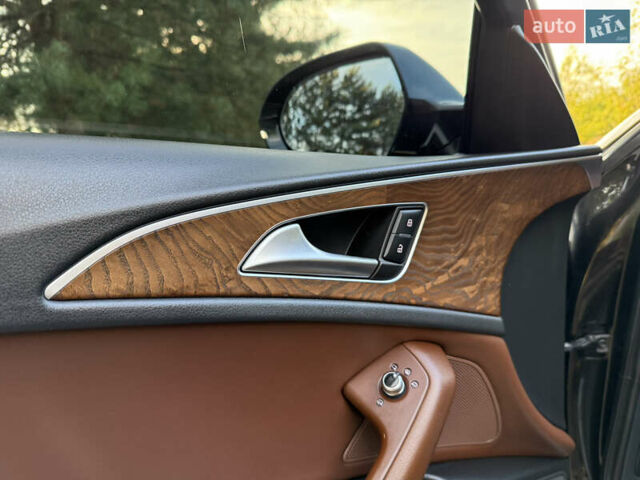 Чорний Ауді А6, об'ємом двигуна 2 л та пробігом 242 тис. км за 13499 $, фото 22 на Automoto.ua
