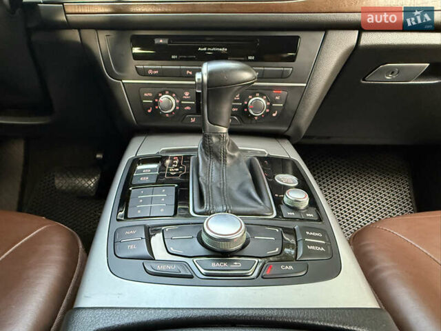 Чорний Ауді А6, об'ємом двигуна 2 л та пробігом 242 тис. км за 13499 $, фото 39 на Automoto.ua