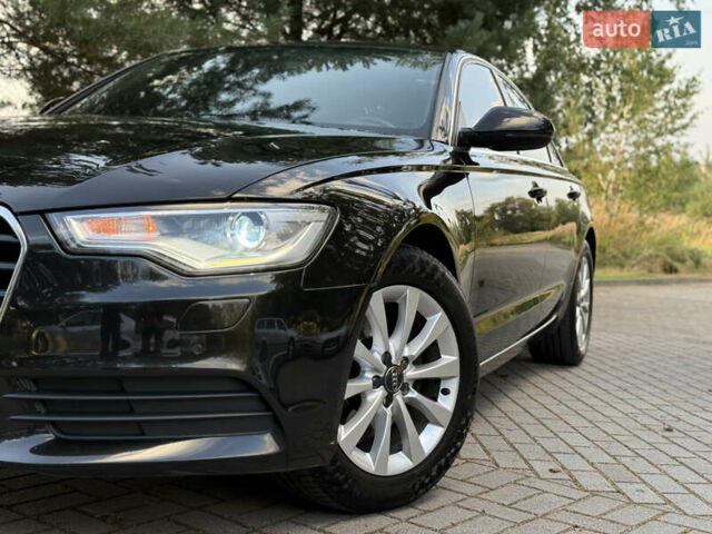 Чорний Ауді А6, об'ємом двигуна 2 л та пробігом 242 тис. км за 13499 $, фото 2 на Automoto.ua
