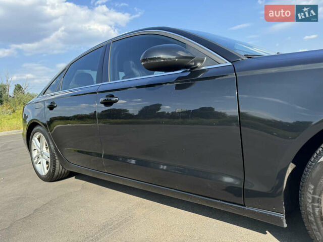 Черный Ауди А6, объемом двигателя 1.98 л и пробегом 235 тыс. км за 12500 $, фото 9 на Automoto.ua