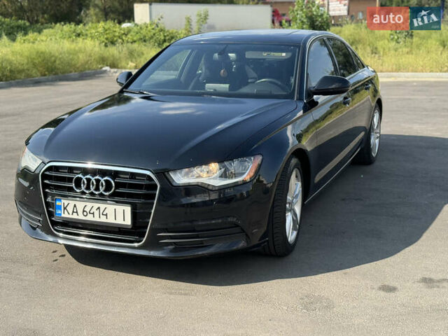 Черный Ауди А6, объемом двигателя 1.98 л и пробегом 235 тыс. км за 12500 $, фото 1 на Automoto.ua