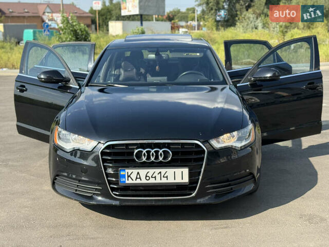 Черный Ауди А6, объемом двигателя 1.98 л и пробегом 235 тыс. км за 12500 $, фото 4 на Automoto.ua
