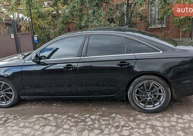 Черный Ауди А6, объемом двигателя 2 л и пробегом 270 тыс. км за 7800 $, фото 3 на Automoto.ua