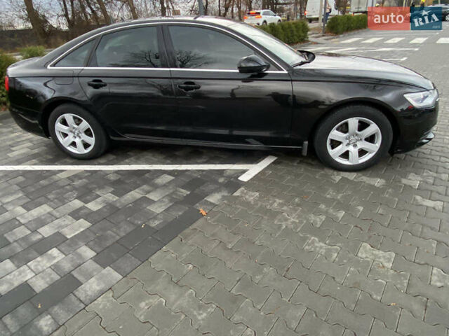 Черный Ауди А6, объемом двигателя 2 л и пробегом 135 тыс. км за 14700 $, фото 4 на Automoto.ua