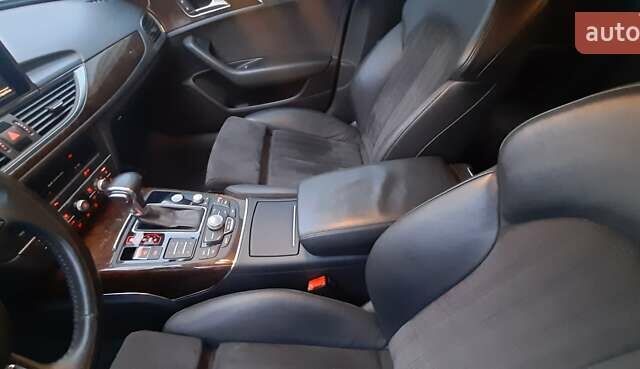 Чорний Ауді А6, об'ємом двигуна 2 л та пробігом 142 тис. км за 12900 $, фото 1 на Automoto.ua