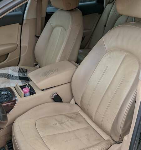Черный Ауди А6, объемом двигателя 2 л и пробегом 270 тыс. км за 7800 $, фото 1 на Automoto.ua