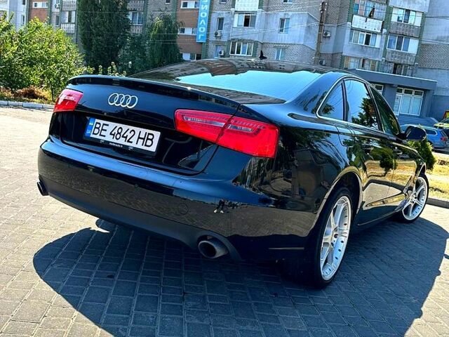Черный Ауди А6, объемом двигателя 2 л и пробегом 220 тыс. км за 12649 $, фото 2 на Automoto.ua