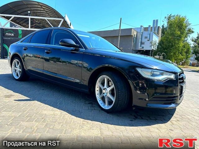 Черный Ауди А6, объемом двигателя 2 л и пробегом 220 тыс. км за 12649 $, фото 4 на Automoto.ua