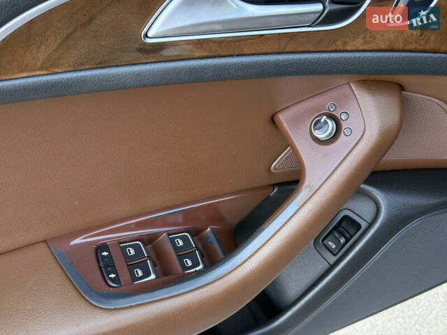 Черный Ауди А6, объемом двигателя 2 л и пробегом 230 тыс. км за 11900 $, фото 17 на Automoto.ua