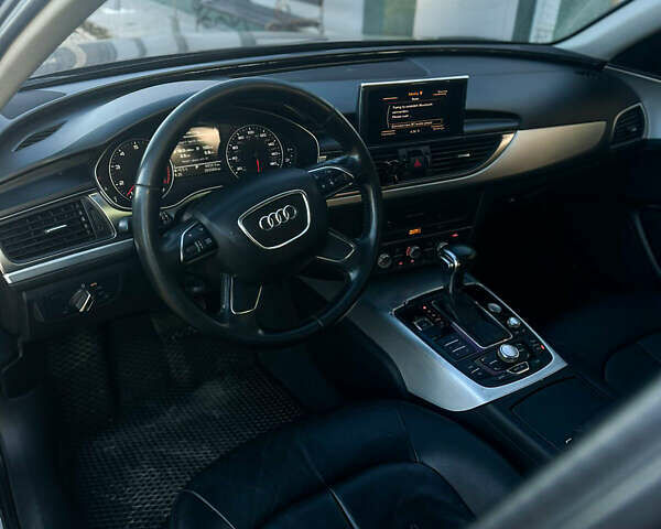 Черный Ауди А6, объемом двигателя 2 л и пробегом 265 тыс. км за 12750 $, фото 4 на Automoto.ua