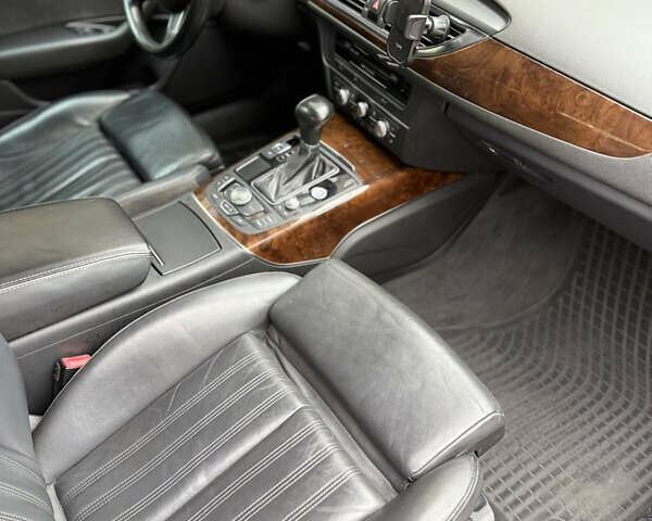 Черный Ауди А6, объемом двигателя 1.97 л и пробегом 286 тыс. км за 14900 $, фото 10 на Automoto.ua