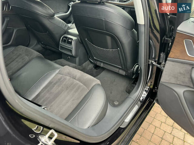 Черный Ауди А6, объемом двигателя 3 л и пробегом 144 тыс. км за 17950 $, фото 76 на Automoto.ua