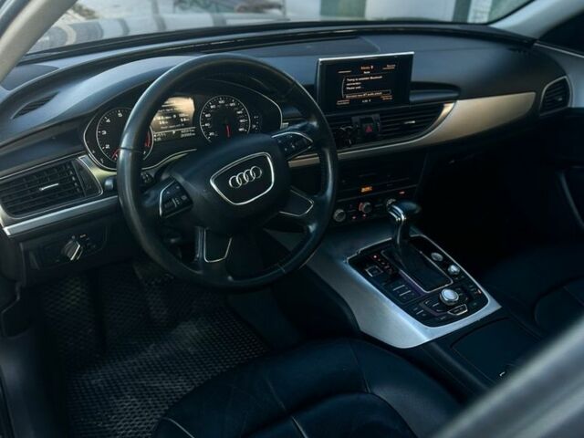 Черный Ауди А6, объемом двигателя 2 л и пробегом 265 тыс. км за 12750 $, фото 4 на Automoto.ua