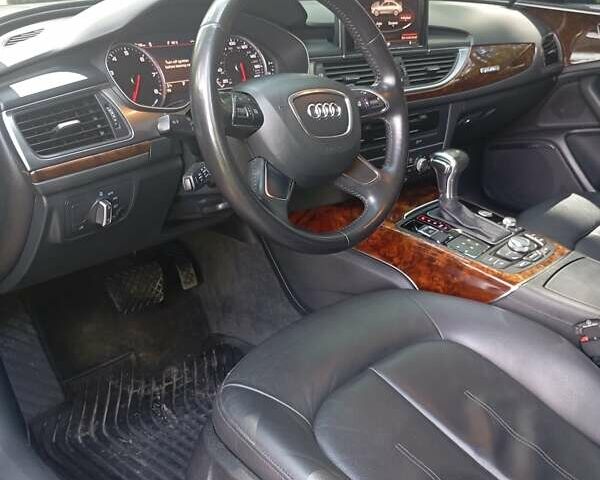 Чорний Ауді А6, об'ємом двигуна 1.98 л та пробігом 261 тис. км за 11500 $, фото 6 на Automoto.ua