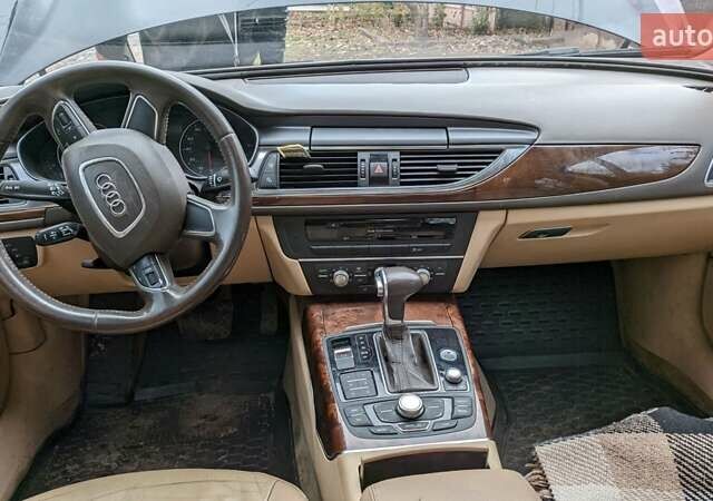 Черный Ауди А6, объемом двигателя 2 л и пробегом 270 тыс. км за 7800 $, фото 7 на Automoto.ua