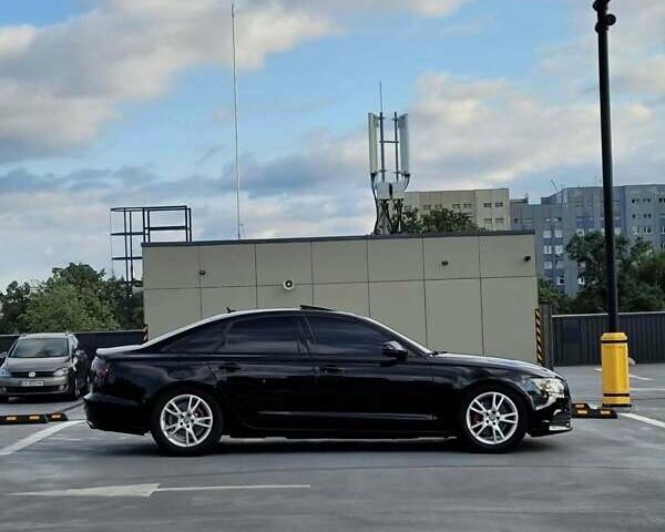 Чорний Ауді А6, об'ємом двигуна 1.98 л та пробігом 268 тис. км за 11450 $, фото 6 на Automoto.ua