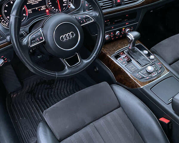 Черный Ауди А6, объемом двигателя 2 л и пробегом 135 тыс. км за 14700 $, фото 7 на Automoto.ua