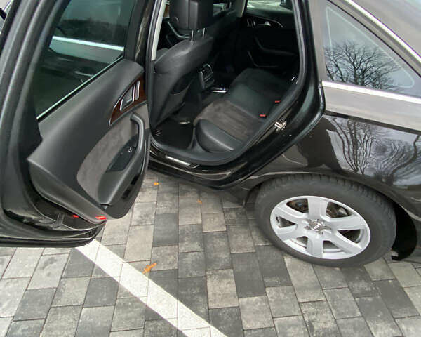 Черный Ауди А6, объемом двигателя 2 л и пробегом 135 тыс. км за 14700 $, фото 8 на Automoto.ua