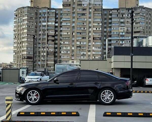 Чорний Ауді А6, об'ємом двигуна 1.98 л та пробігом 268 тис. км за 11450 $, фото 2 на Automoto.ua