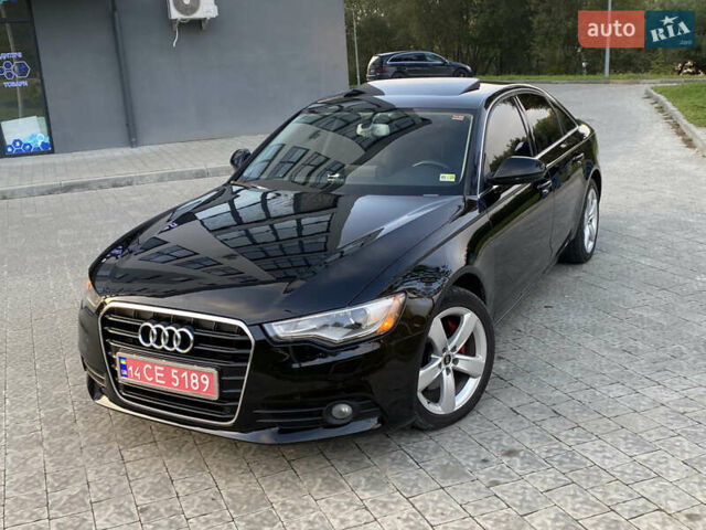 Черный Ауди А6, объемом двигателя 2 л и пробегом 245 тыс. км за 11500 $, фото 1 на Automoto.ua