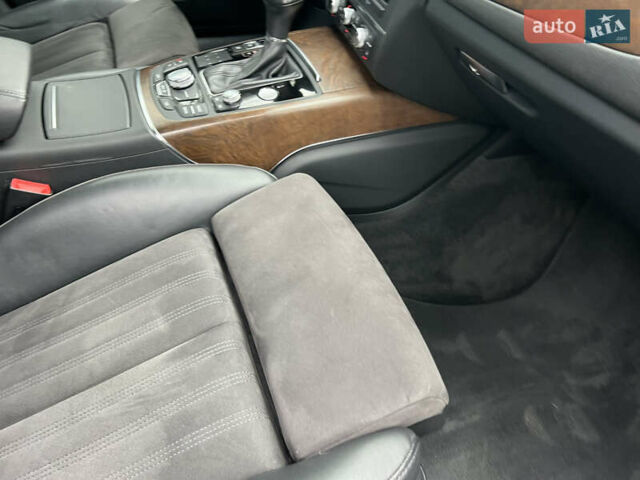 Черный Ауди А6, объемом двигателя 3 л и пробегом 144 тыс. км за 17950 $, фото 90 на Automoto.ua