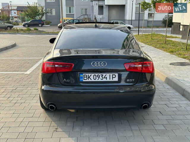Черный Ауди А6, объемом двигателя 1.98 л и пробегом 260 тыс. км за 9750 $, фото 6 на Automoto.ua