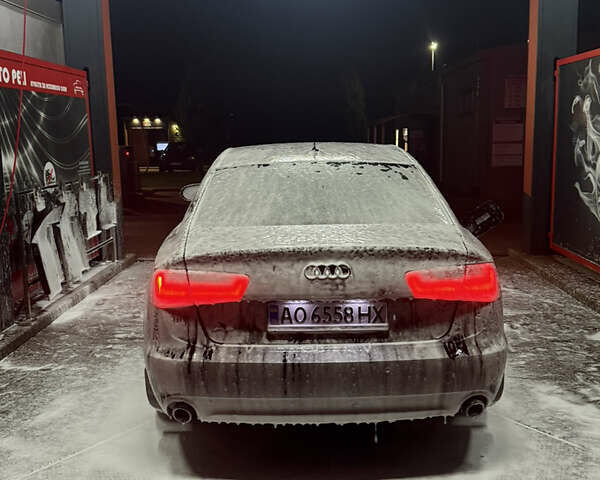 Чорний Ауді А6, об'ємом двигуна 1.98 л та пробігом 235 тис. км за 12500 $, фото 1 на Automoto.ua