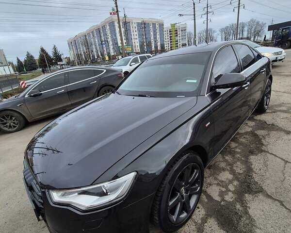 Чорний Ауді А6, об'ємом двигуна 2 л та пробігом 187 тис. км за 12000 $, фото 1 на Automoto.ua