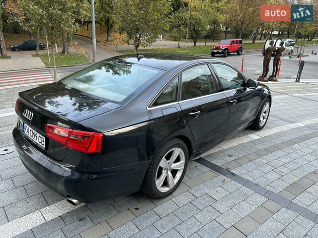 Чорний Ауді А6, об'ємом двигуна 1.98 л та пробігом 268 тис. км за 13600 $, фото 2 на Automoto.ua