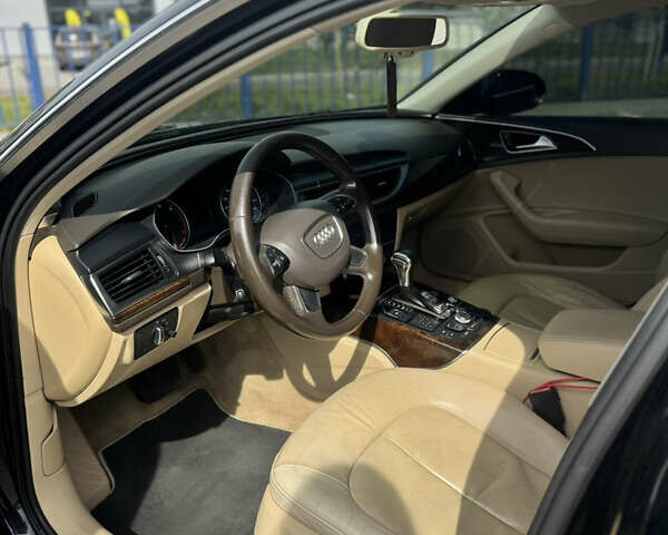 Черный Ауди А6, объемом двигателя 1.98 л и пробегом 272 тыс. км за 12500 $, фото 7 на Automoto.ua