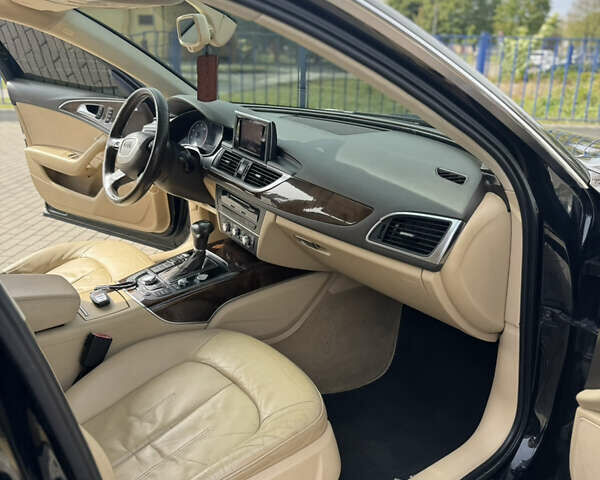 Черный Ауди А6, объемом двигателя 1.98 л и пробегом 272 тыс. км за 12500 $, фото 8 на Automoto.ua