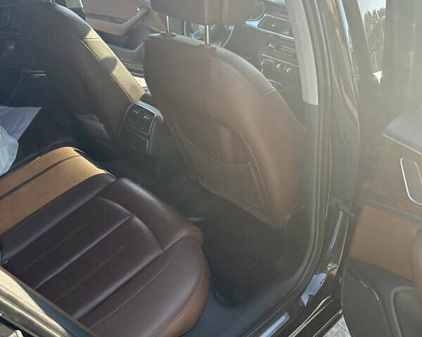 Черный Ауди А6, объемом двигателя 1.98 л и пробегом 206 тыс. км за 14300 $, фото 9 на Automoto.ua