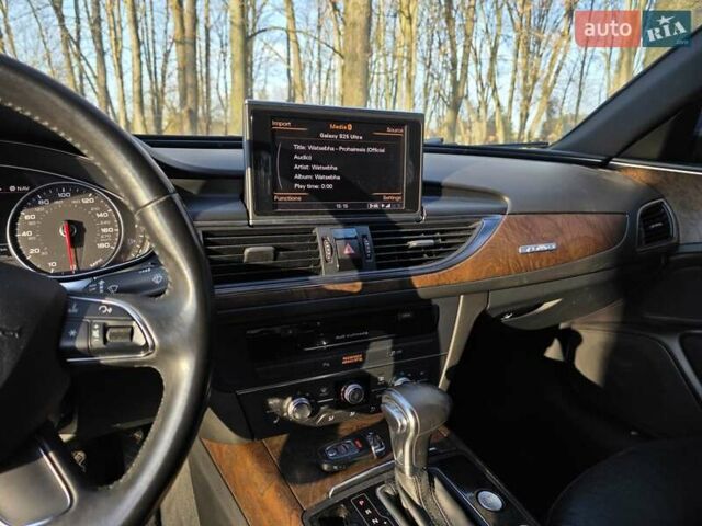 Черный Ауди А6, объемом двигателя 2 л и пробегом 219 тыс. км за 12800 $, фото 17 на Automoto.ua