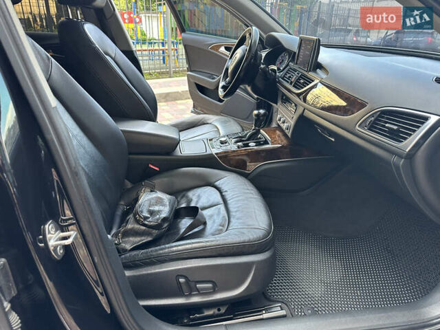 Черный Ауди А6, объемом двигателя 1.98 л и пробегом 173 тыс. км за 13800 $, фото 11 на Automoto.ua