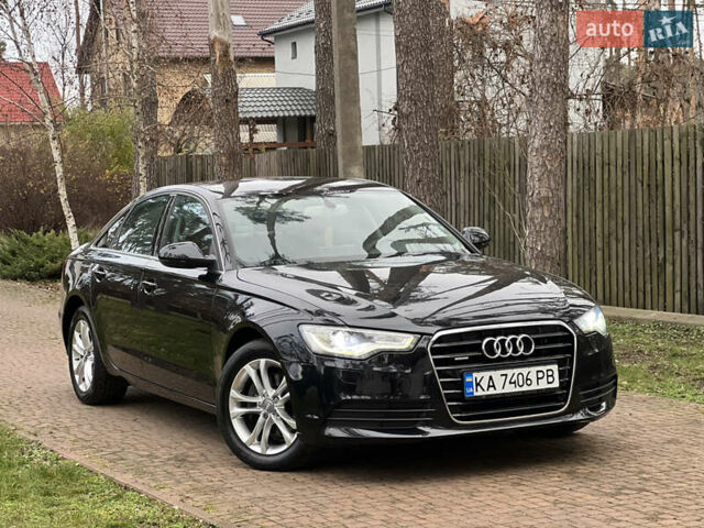 Черный Ауди А6, объемом двигателя 3 л и пробегом 144 тыс. км за 17950 $, фото 1 на Automoto.ua