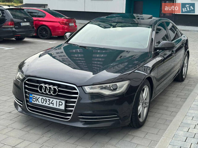 Черный Ауди А6, объемом двигателя 1.98 л и пробегом 260 тыс. км за 9750 $, фото 1 на Automoto.ua