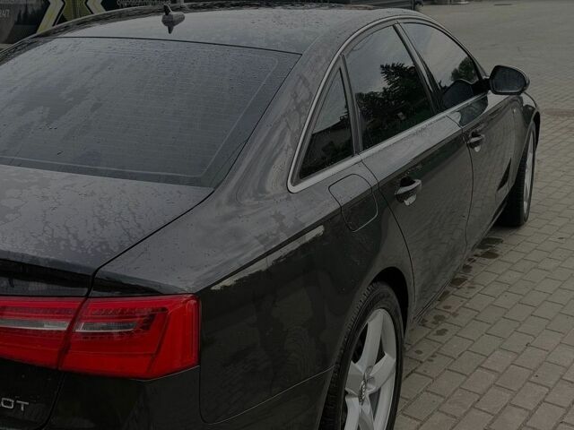 Черный Ауди А6, объемом двигателя 2 л и пробегом 175 тыс. км за 11500 $, фото 1 на Automoto.ua