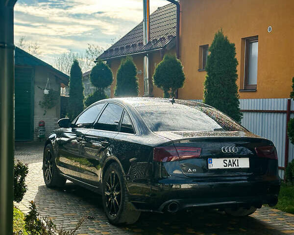 Черный Ауди А6, объемом двигателя 2 л и пробегом 265 тыс. км за 12750 $, фото 3 на Automoto.ua